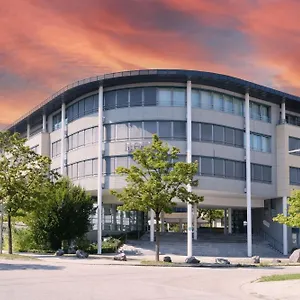 Отель Four Munich Neue Messe Ашхайм